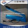 Cheap price high quality aluminum body hand pressing impulse side-cut sealer machine
